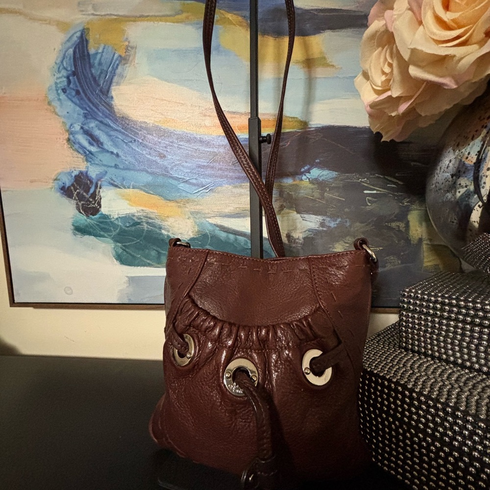 Vintage B. Makowsky brown leather crossbody bucket bag.